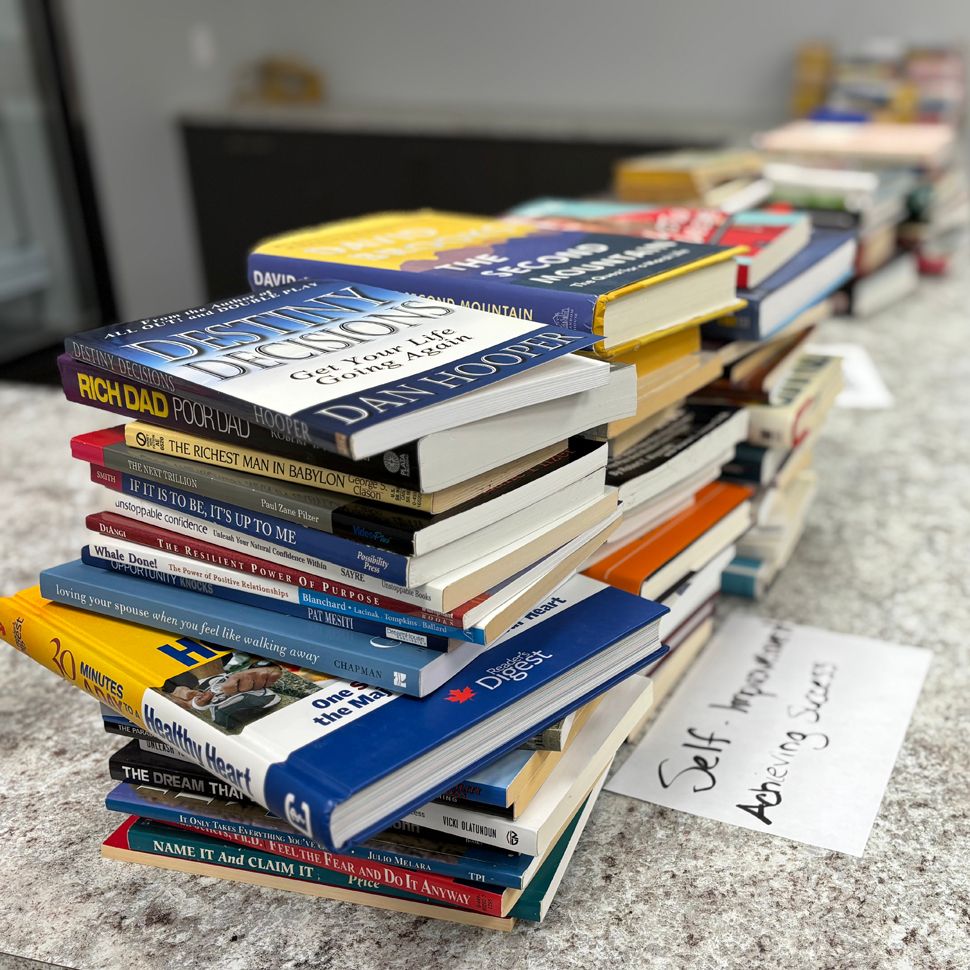 Books being sorted inside the Niverville Lending Library.